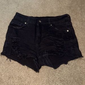I am selling these very trendy black distressed jean shorts.